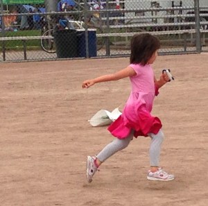 Ellie trying to get her kite in the air. 
