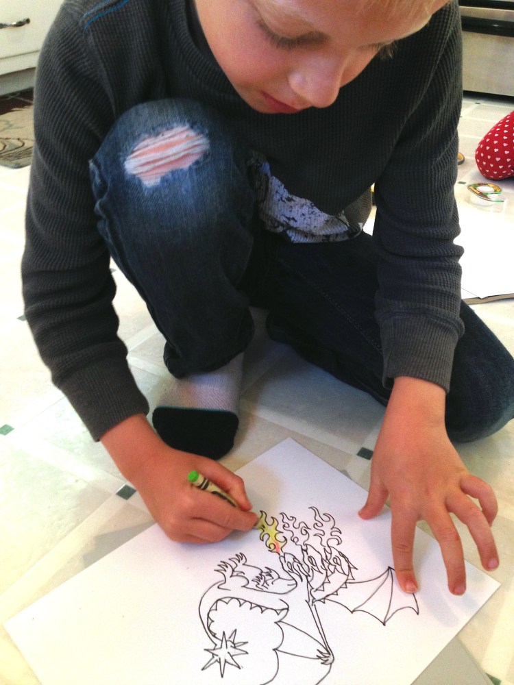 Jack coloring his dragon. 