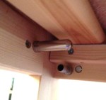 Wire curtain hangers in progress. 